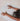 Woman's hands in childs pose on Rituil bone colored cork yoga mat #color_bone