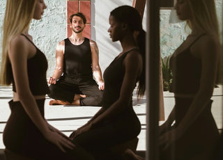 Woman and Man meditating on sustainable cork yoga mat