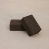 Two sustainable natural brown cork yoga blocks from Rituil, ideal for yoga and pilates practice and stretching exercises. #color_earth