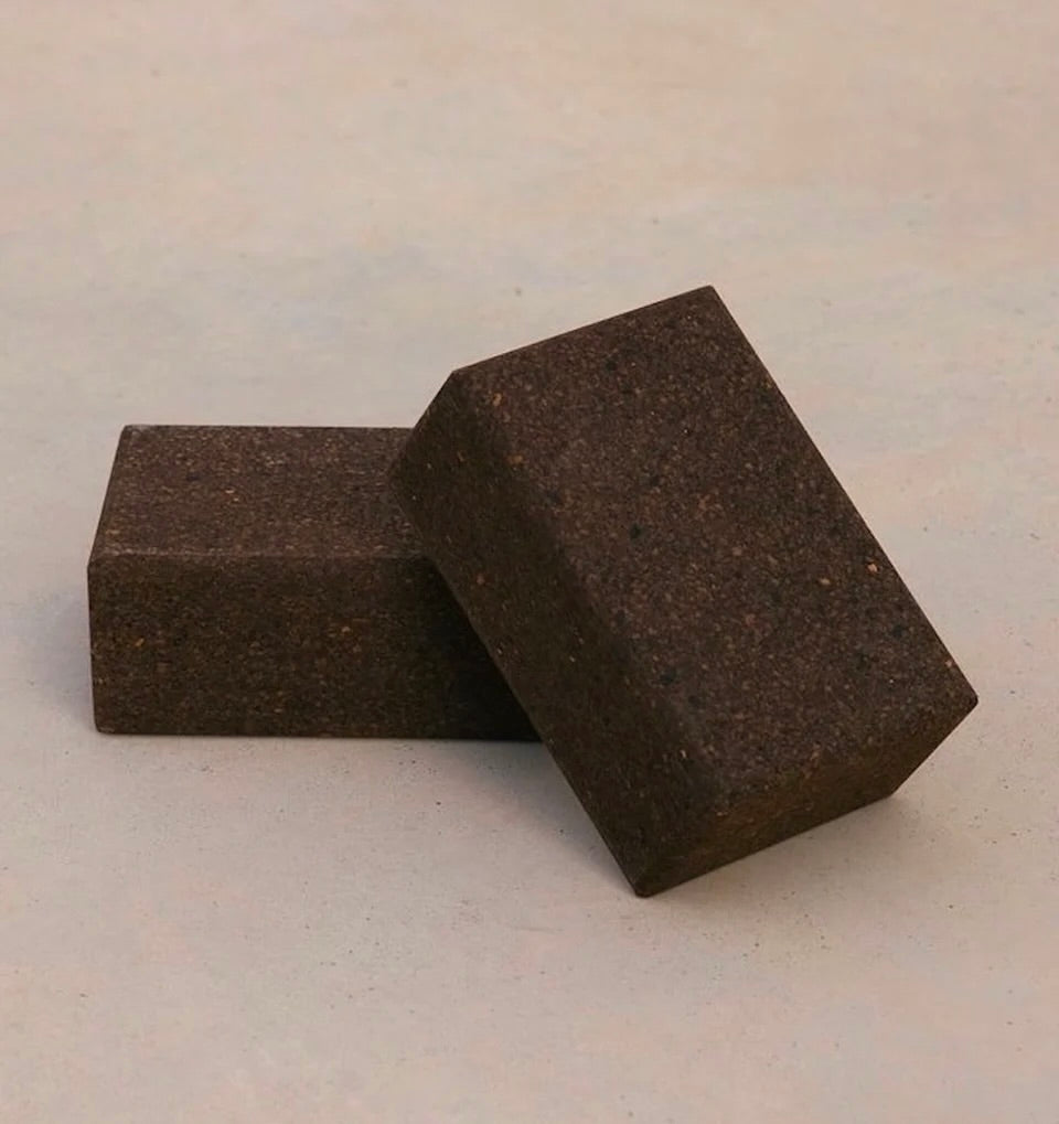 Two sustainable natural brown cork yoga blocks from Rituil, ideal for yoga and pilates practice and stretching exercises. #color_earth