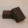 Two sustainable natural brown cork yoga blocks from Rituil, ideal for yoga and pilates practice and stretching exercises. #color_earth