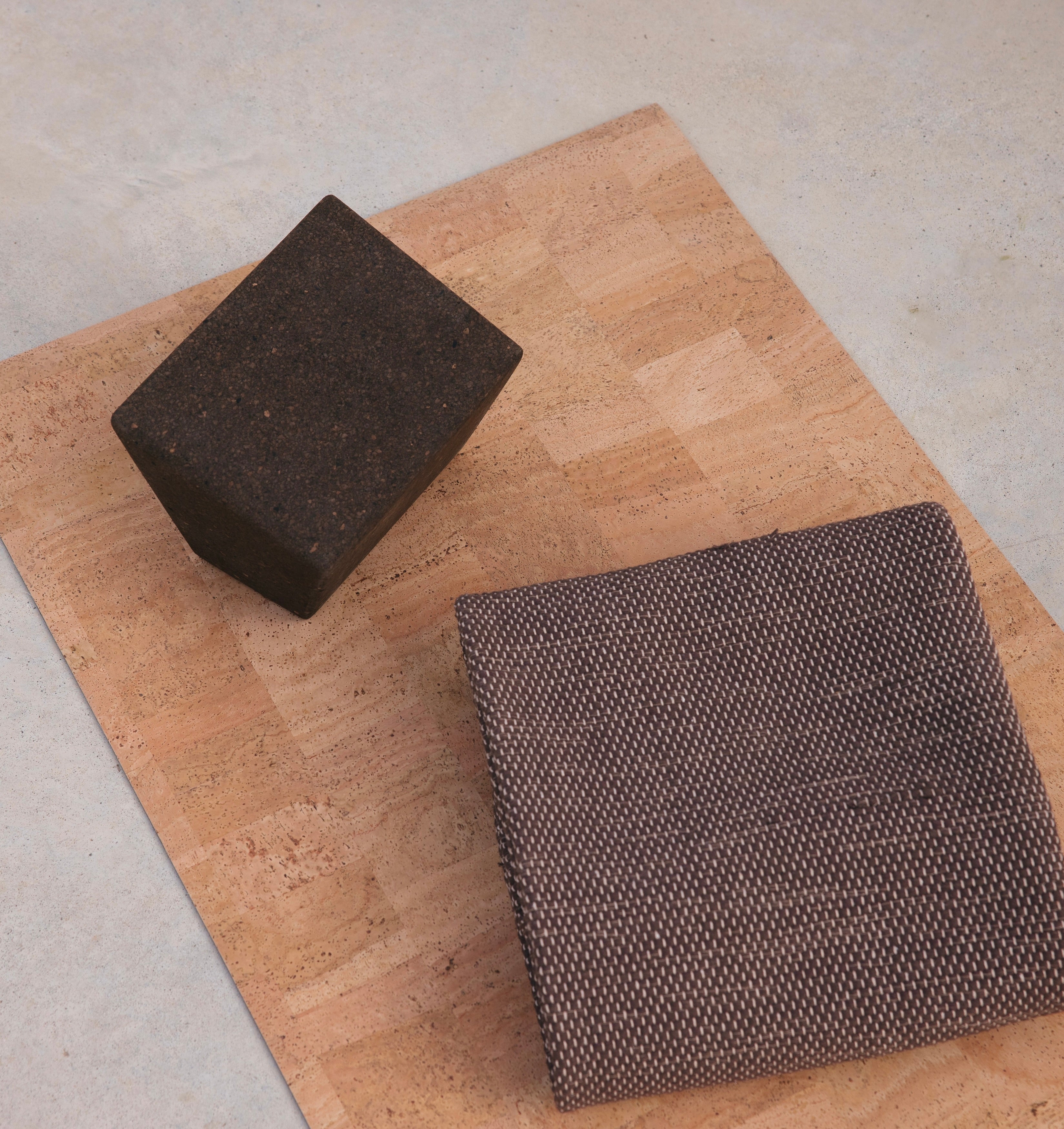 Rituil restoratrive cork yoga block with sustainable cotton yoga rug and cork leather yoga mat.