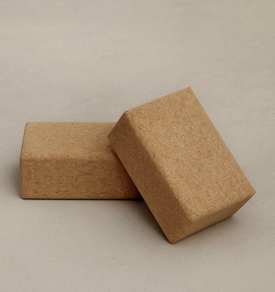 Two sustainable natura cork yoga blocks from Rituil, ideal for yoga and pilates practice and stretching exercises. #color_sand
