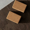 Rituil sustainable brown cork leather yoga mat featuring a non-slip, non-toxic, non-pvc, textured surface with set of natural  cork yoga blocks