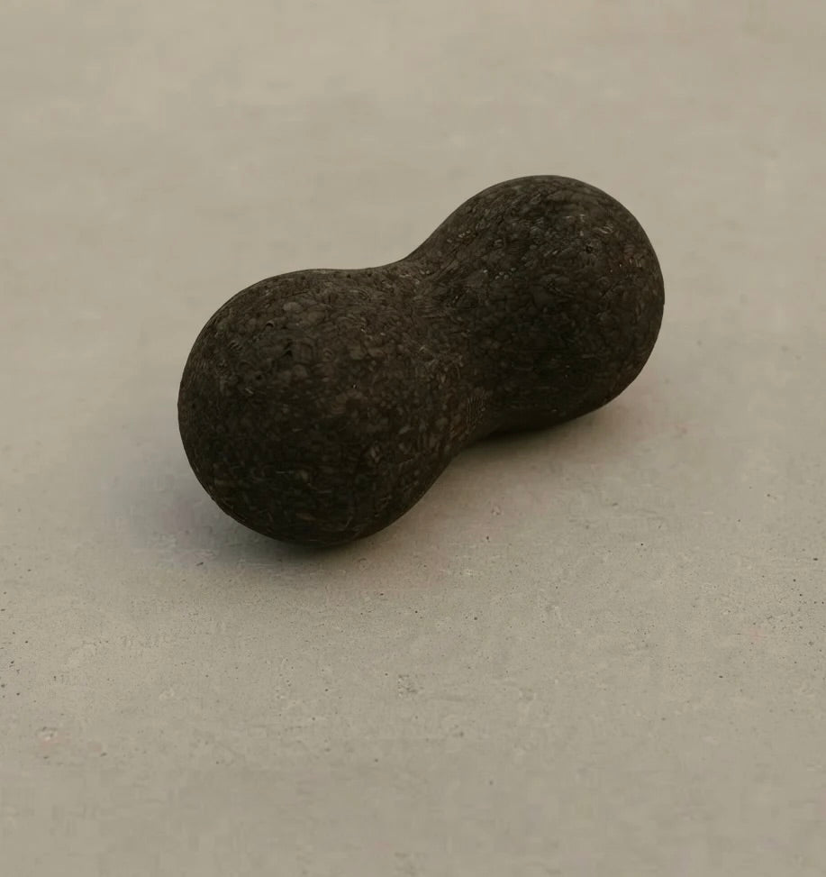 Rituil sustainable Portuguese cork peanut roller for spine mobility and targeted back muscle release.