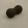 Rituil sustainable Portuguese cork peanut roller for spine mobility and targeted back muscle release.