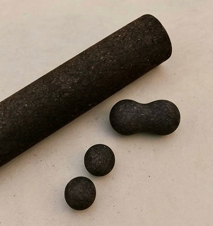 Rituil sustainable Portuguese cork massge roller, peanut and balls for yoga, Pilates core workouts, and deep tissue muscle recovery shown on concrete floor