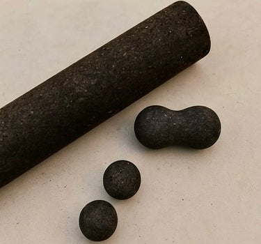 Rituil sustainable Portuguese cork massge roller, peanut and balls for yoga, Pilates core workouts, and deep tissue muscle recovery shown on concrete floor