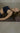 woman laying on RItuil cork yoga mat with head on Rituil yoga rug and using a cork yoga block.
