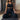 Woman in black athletic wear sitting in a meditative pose on rituil natural non slip yoga rug. #color_ash