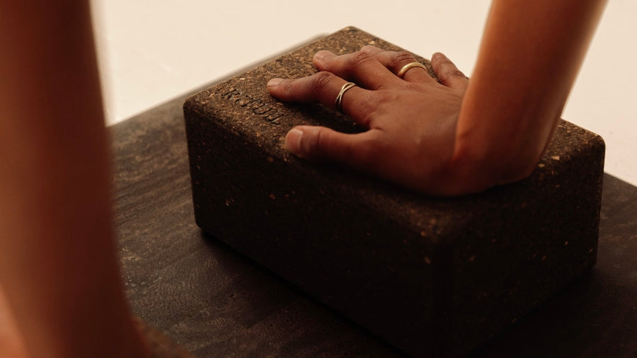 close up of non toxic Rituil cork yoga block on cork leather yoga mat brown