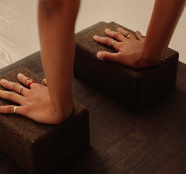 close up of non toxic Rituil cork yoga block on cork leather yoga mat brown #color_earth
