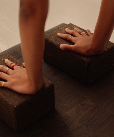 close up of non toxic Rituil cork yoga block on cork leather yoga mat brown #color_earth