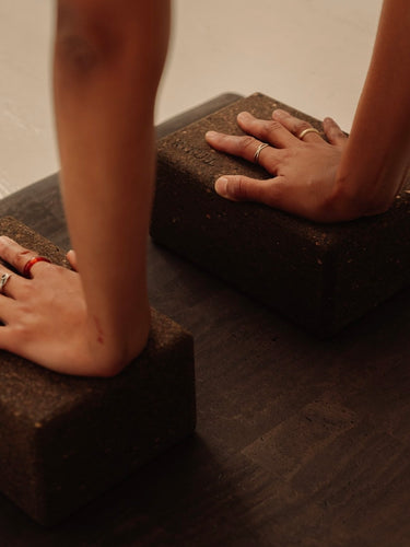 close up of non toxic Rituil cork yoga block on cork leather yoga mat brown #color_earth
