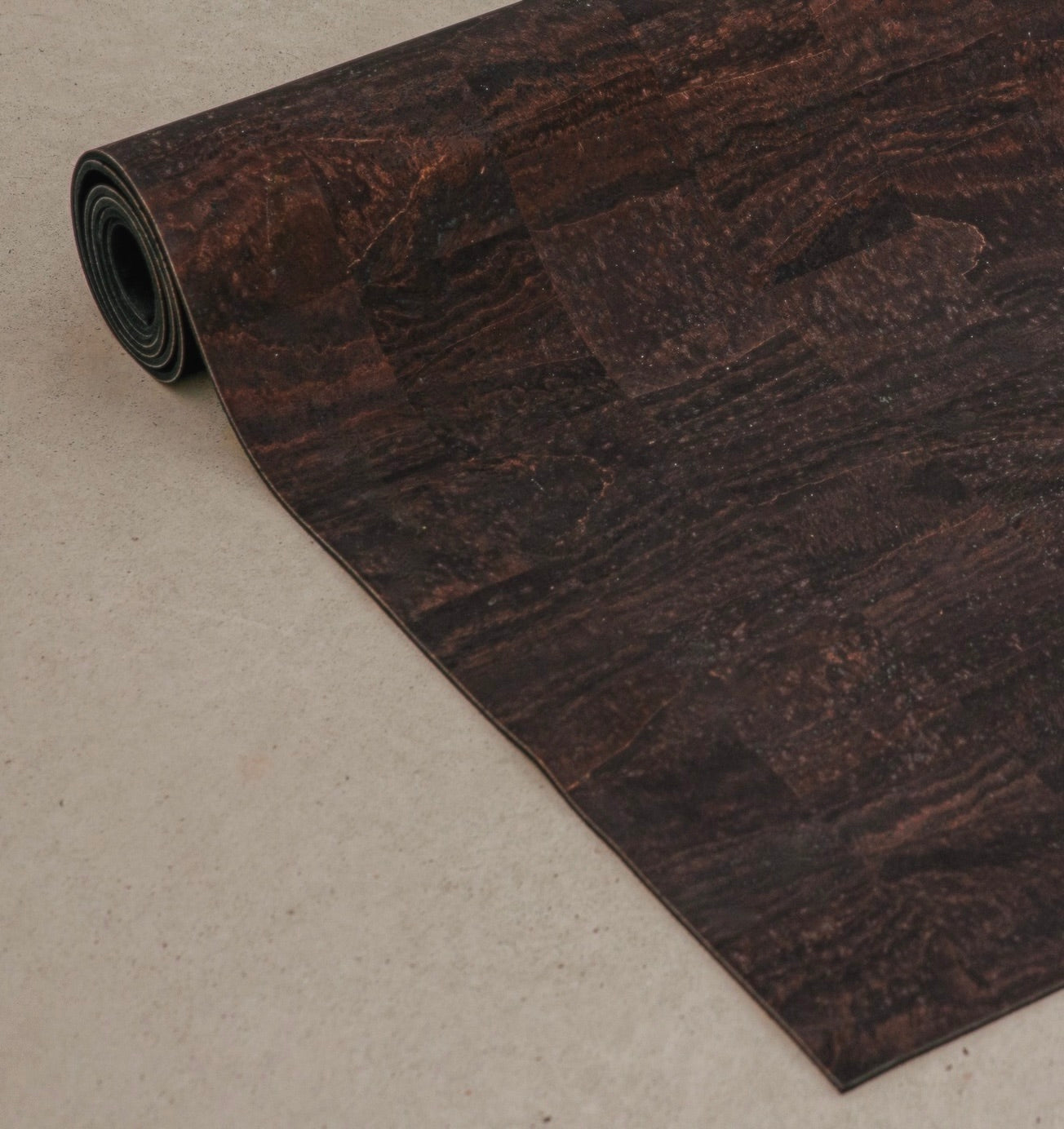 Rituil sustainable natural brown cork leather yoga mat featuring a non-slip, non-toxic, pvc free, textured surface