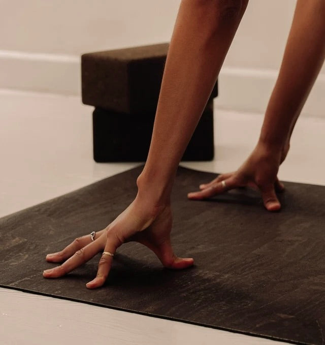 woman practicing yoga on brown rituil non-slip non-toxic sustainable cork leather yoga mat  #color_earth