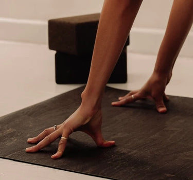 woman practicing yoga on brown rituil non-slip non-toxic sustainable cork leather yoga mat  #color_earth
