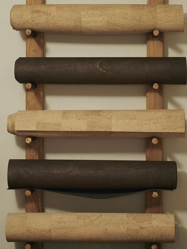Rituil cork yoga mats rolled on wall