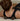 Person using a massage cork spheres on their back