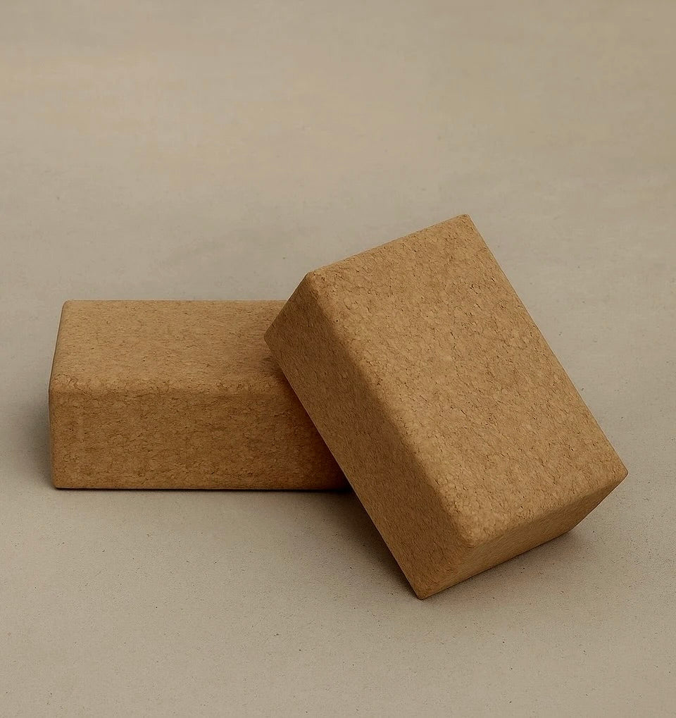 Two sustainable natura cork yoga blocks from Rituil, ideal for yoga and pilates practice and stretching exercises. #color_sand