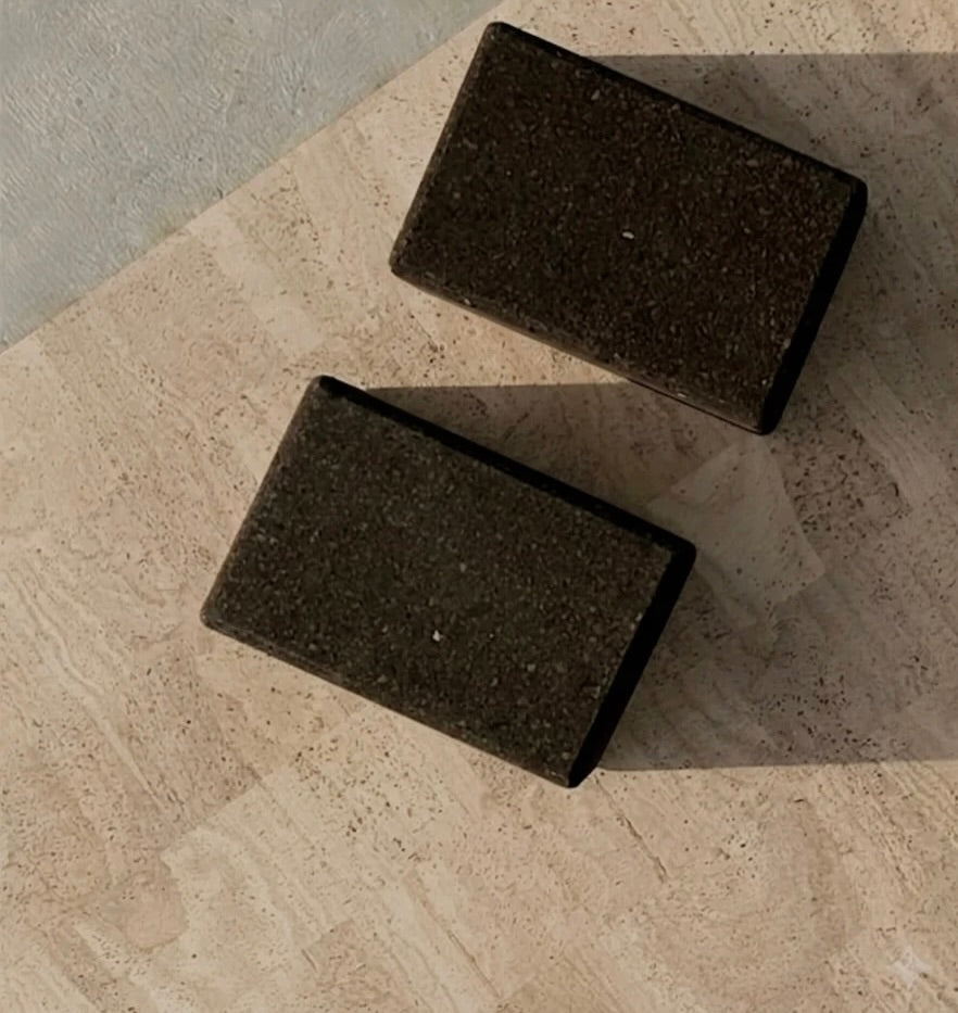 cork yoga blocks in brown on cream cork leather yoga mat