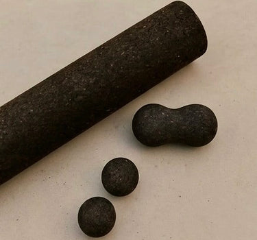 Rituil natural cork peanut roller paired with massage spheres and the main cork fitness roller.