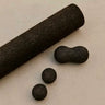 Rituil natural cork peanut roller paired with massage spheres and the main cork fitness roller.