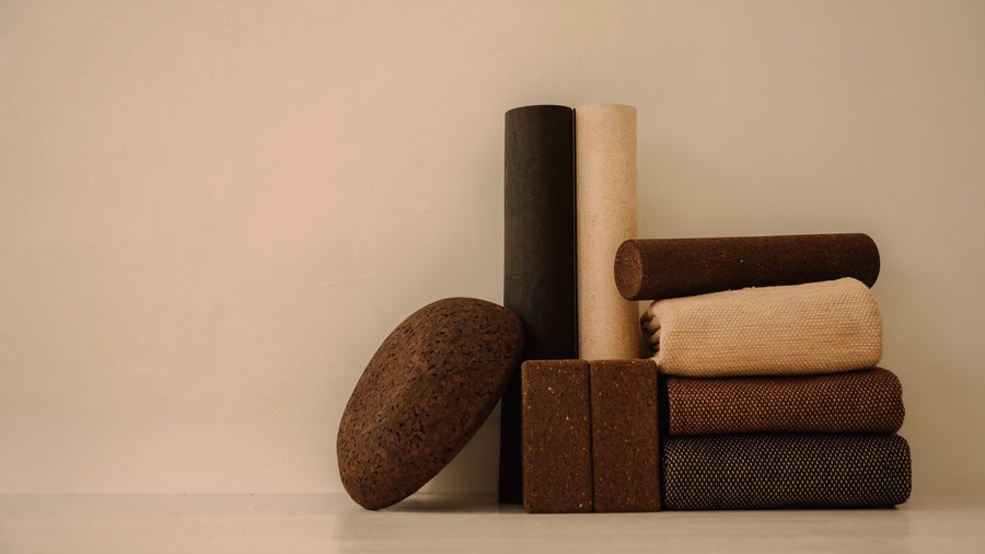 Rituil luxury cork leather yoga mats, blocks, rugs and meditation essentials on white floor