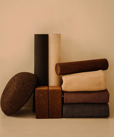 Rituil luxury cork leather yoga mats, blocks, rugs and meditation essentials on white floor