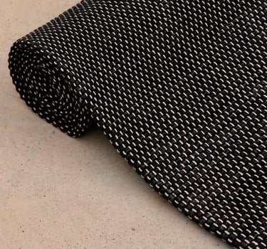 Rituil travel yoga rug in ash color, lightweight and portable, designed for yoga practice on the go.