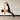 woman doing yoga on Rituil cork non slip yoga mat #color_stone