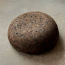 Rituil cork meditation seat on top of concrete floor