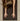 womans hands in childs pose on Rituil earth or brown colored cork yoga mat #color_earth
