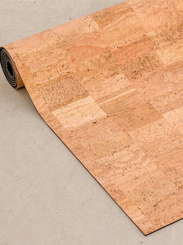 Rituil™ sand cork yoga mat detail image of mat rolled up #color_sand