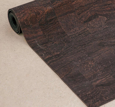 Rituil sustainable natural brown cork leather yoga mat featuring a non-slip, non-toxic, pvc free, textured surface