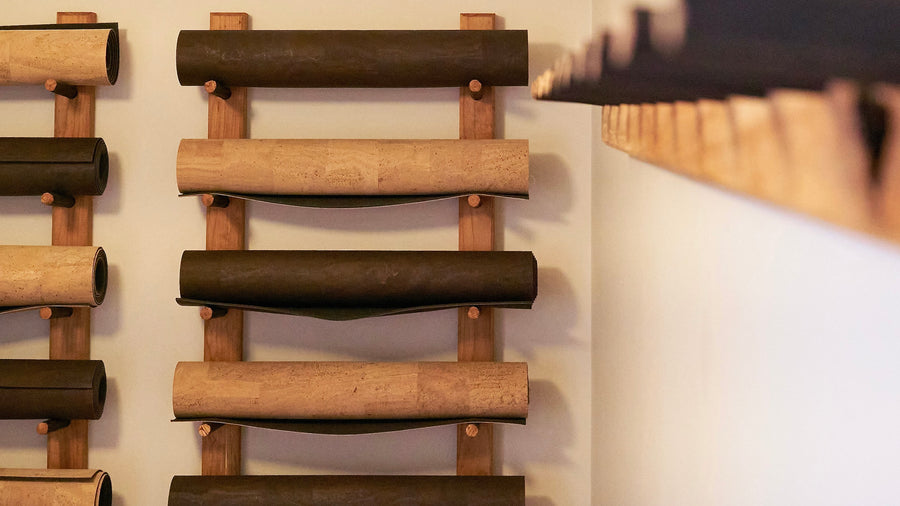 rituil natural cork leather yoga mats on wall
