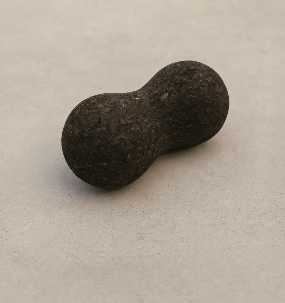 Rituil sustainable Portuguese cork peanut roller for spine mobility and targeted back muscle release.