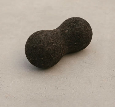 Rituil sustainable Portuguese cork peanut roller for spine mobility and targeted back muscle release.
