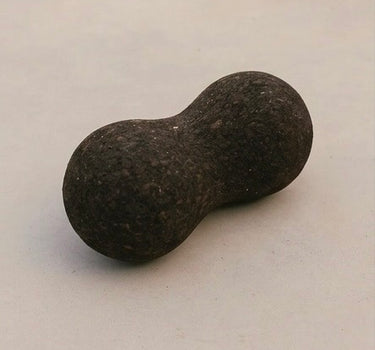 Rituil sustainable Portuguese cork peanut roller for spine mobility and targeted back muscle release.