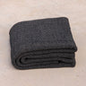 folded Rituil recycled cotton yoga rug in ash or black color #color_ash