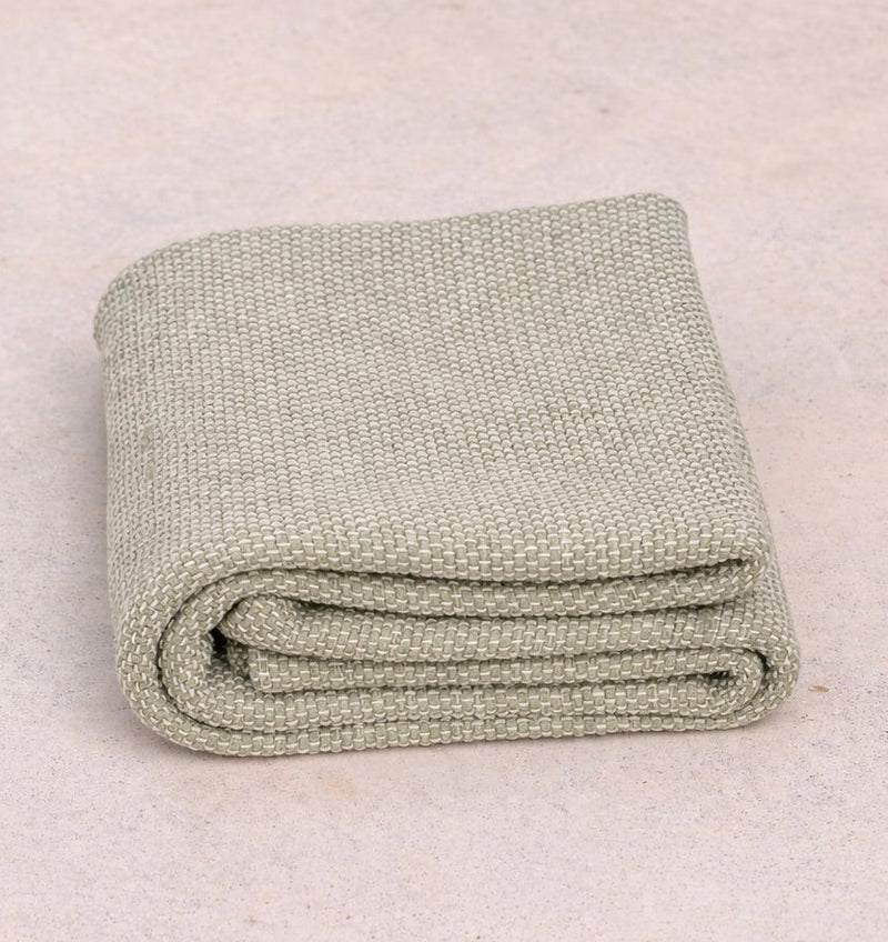 Close-up of Rituil eco friendly yoga rug. #color_bone